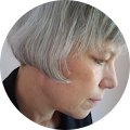 side view of woman with short gray bob haircut